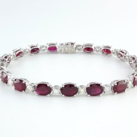 13.51CT RUBY 18KW TENNIS BRACELET - B3989