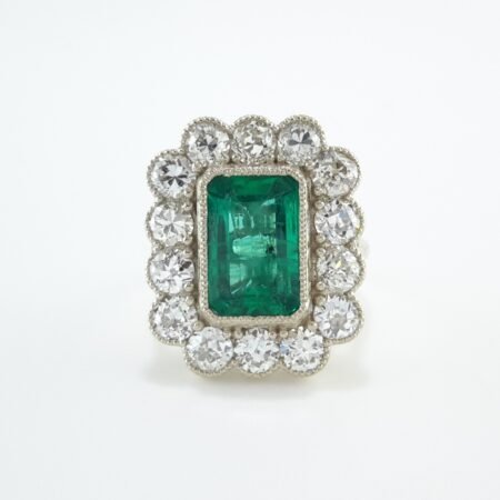 EMERALD & DIA 18KW HALO RING - R11640